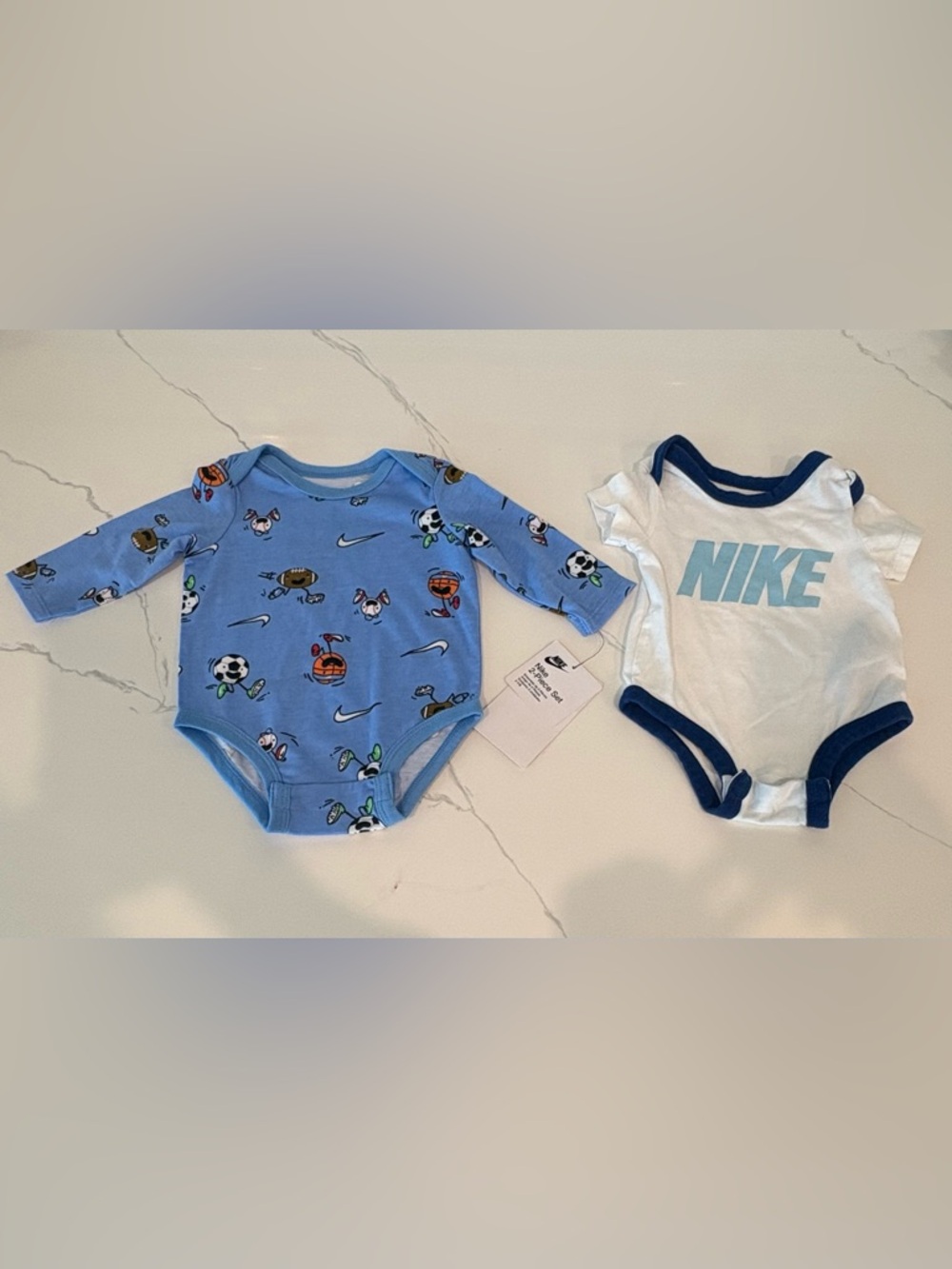 Nike Baby Blue Sports Print (NWT) & White Nike Logo Bodysuit Lot 3M